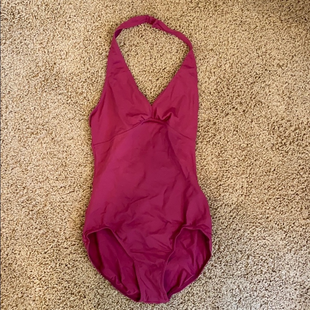 Pink leotard.